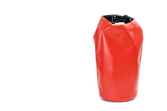Red waterproof bag on isolated white background